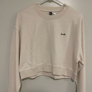 Size medium NWOT H&M Divided cream colored crop sweater